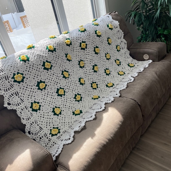 White Crochet Blanket with Yellow and Green Accents